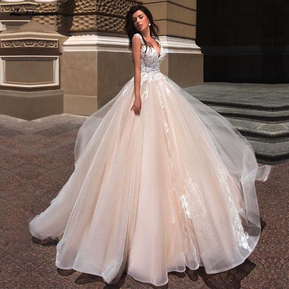 blush pink princess wedding dress 25 Trending Blush and Pink Wedding Dress Styles for 2024
