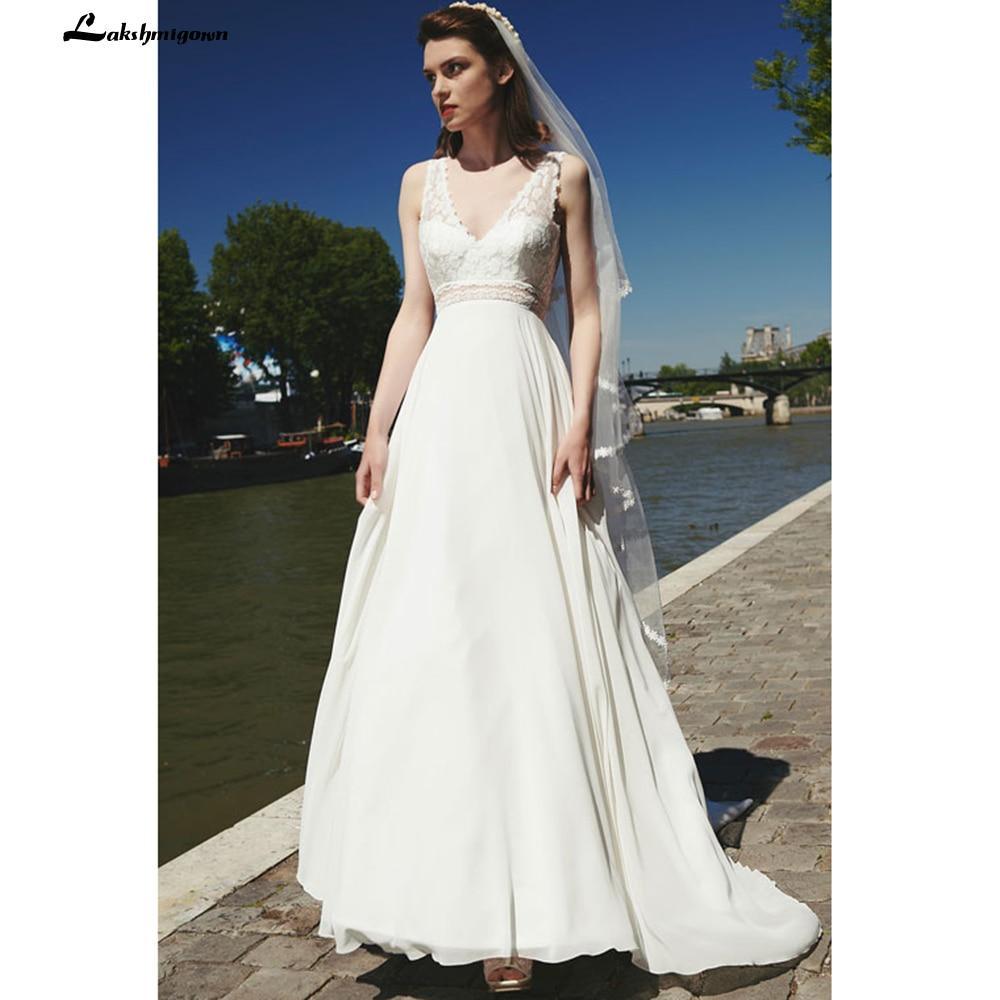 sexy wedding dress beach Lace V Neck Mermaid Spaghetti Straps Backless Elsi John ensuring durability and a comfortable fit for long wedding days Sexy Tulle See-Through A-line V