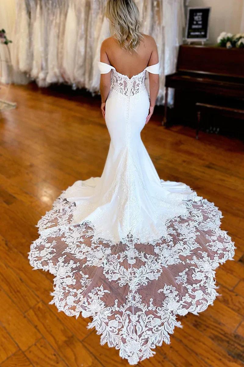 Vestido de novia blanco sirena hombros descubiertos largo con encaje