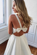 Vestido de novia corte A escote en V blanco largo con lazo