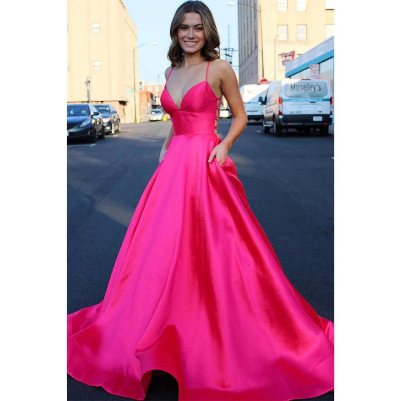 Vestido de fiesta de satén rosa con escote en V pronunciado y bolsillos 