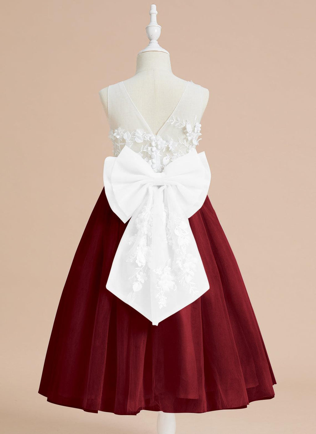 Vestido largo hasta la rodilla con encaje floral y lazo grande 