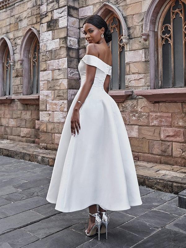 Vestidos de novia princesa satén volantes hombros descubiertos sin mangas largo