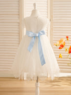 Vestido de niña de las flores de primera comunión color marfil con encaje 