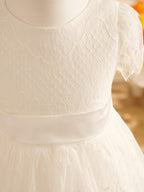 Vestido de niña de las flores de primera comunión color marfil con encaje 