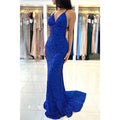 Vestido de fiesta largo de sirena azul con escote en V y tirantes finos con purpurina