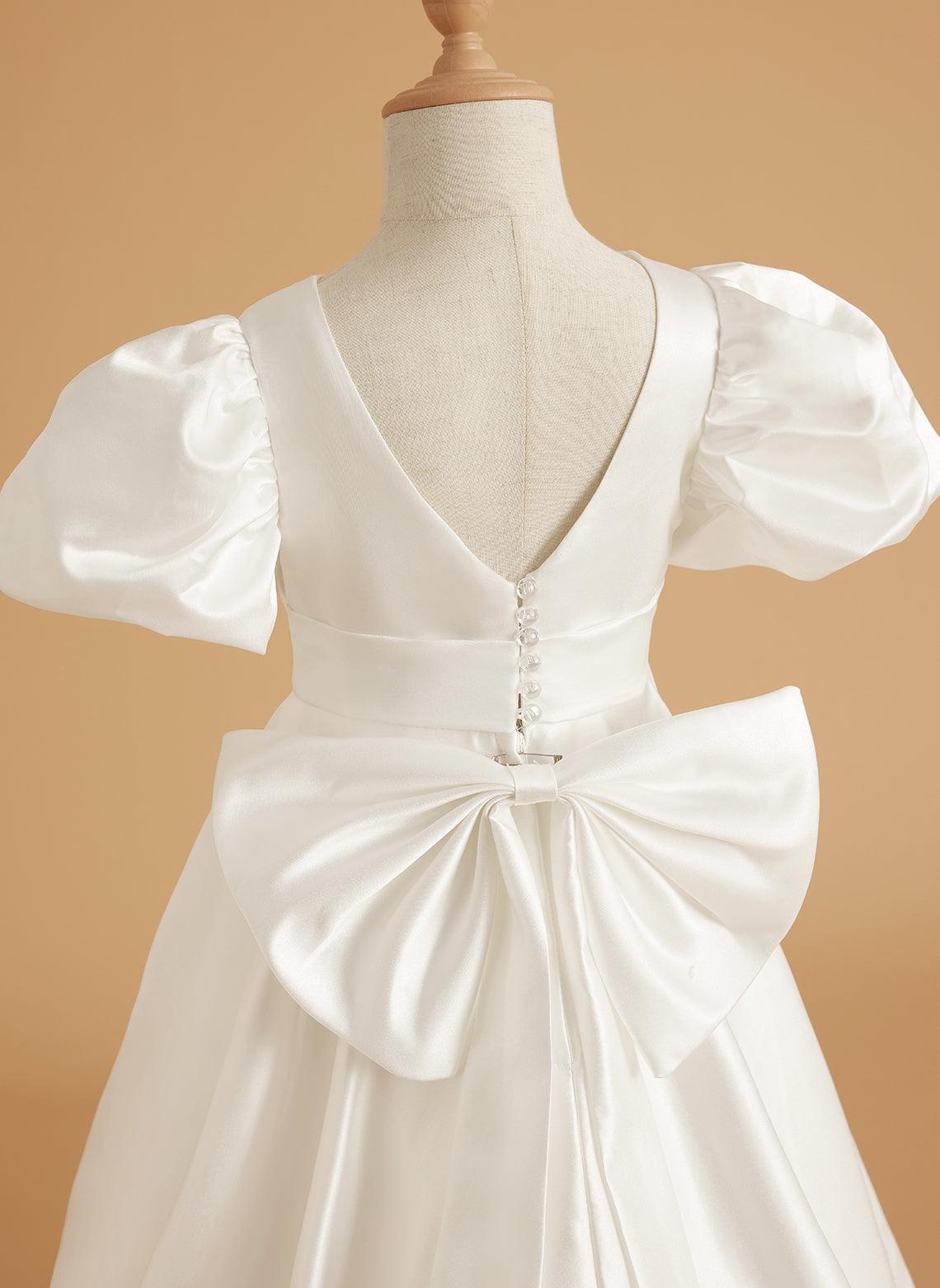 Vestido para niña de las flores con cola larga, mangas abullonadas, lazo en la espalda y botones 