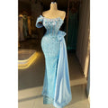 Elegante y lujoso vestido de fiesta azul de un solo hombro con bordado de cuentas 