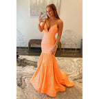 Vestido de fiesta de sirena con escote en V pronunciado y lentejuelas brillantes