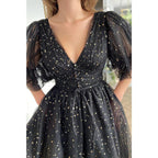 Vestido formal de encaje con estrellas negras, escote en V pronunciado y bolsillos 