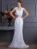 Vestidos de novia largos de satén con apliques y sin mangas de corte trompeta/sirena