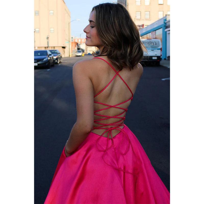 Vestido de fiesta de satén rosa con escote en V pronunciado y bolsillos 