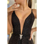 Vestido de fiesta negro brillante con escote en V pronunciado y bolsillos 