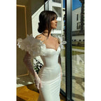 Wunderschönes und bezauberndes langärmliges Meerjungfrau-Ballkleid aus trägerlosem Satin mit Blumenmuster