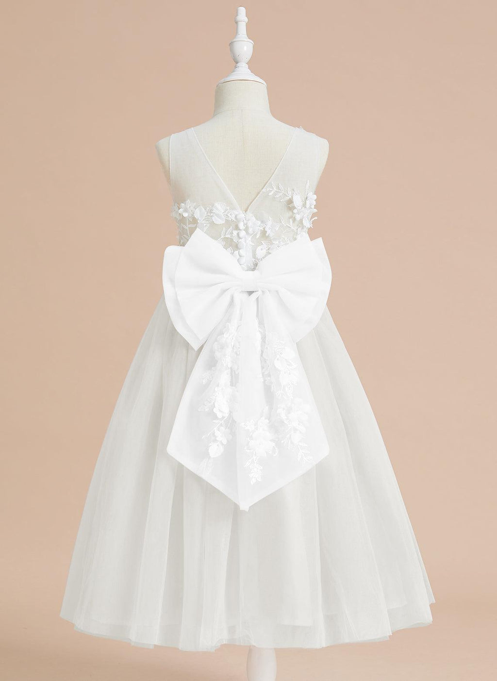 Vestido largo hasta la rodilla con encaje floral y lazo grande 