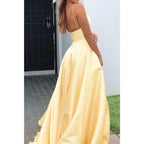 Vestido de fiesta de satén amarillo con escote en V pronunciado y bolsillos 