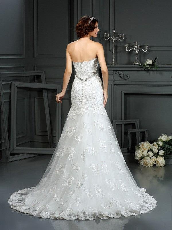 Vestidos de novia largos de encaje sin mangas con cuentas y corte trompeta/sirena