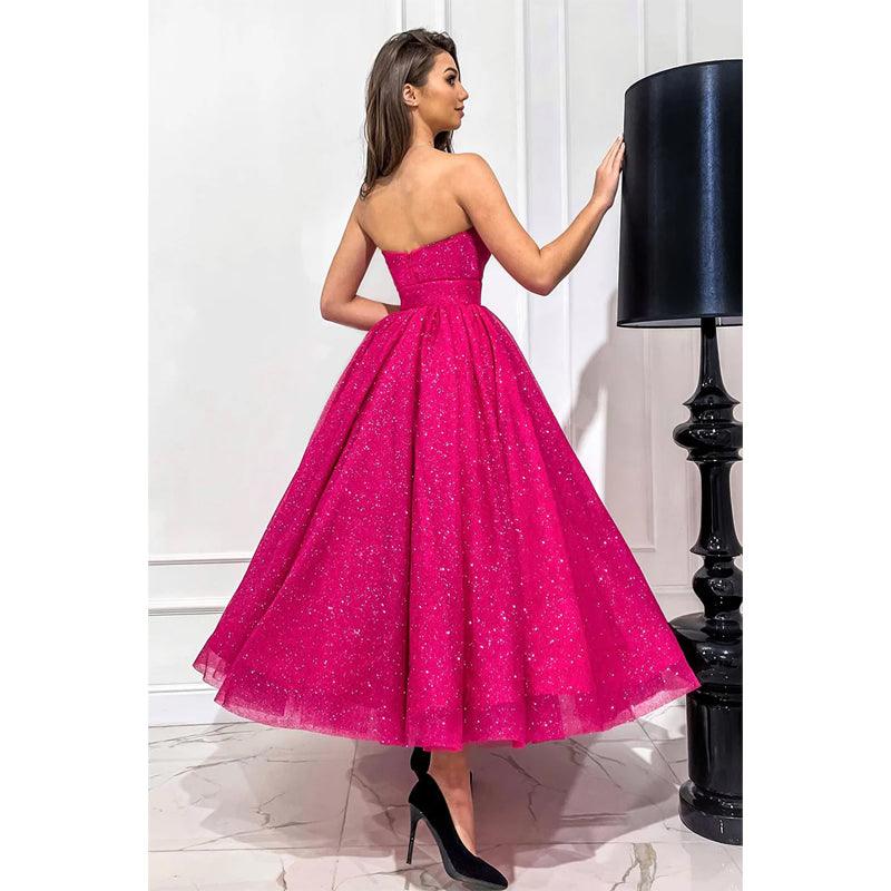Vestido de fiesta vintage fucsia con escote en V pronunciado y purpurina 