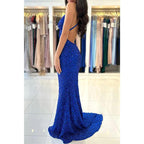 Vestido de fiesta largo de sirena azul con escote en V y tirantes finos con purpurina