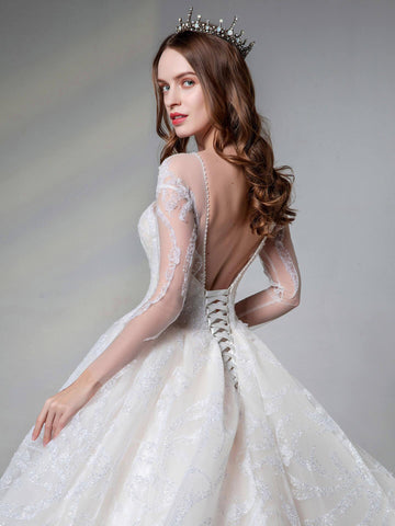 A classic Ball Gown with Sweetheart Neckline Sexy V-back Long See Through Sleeves