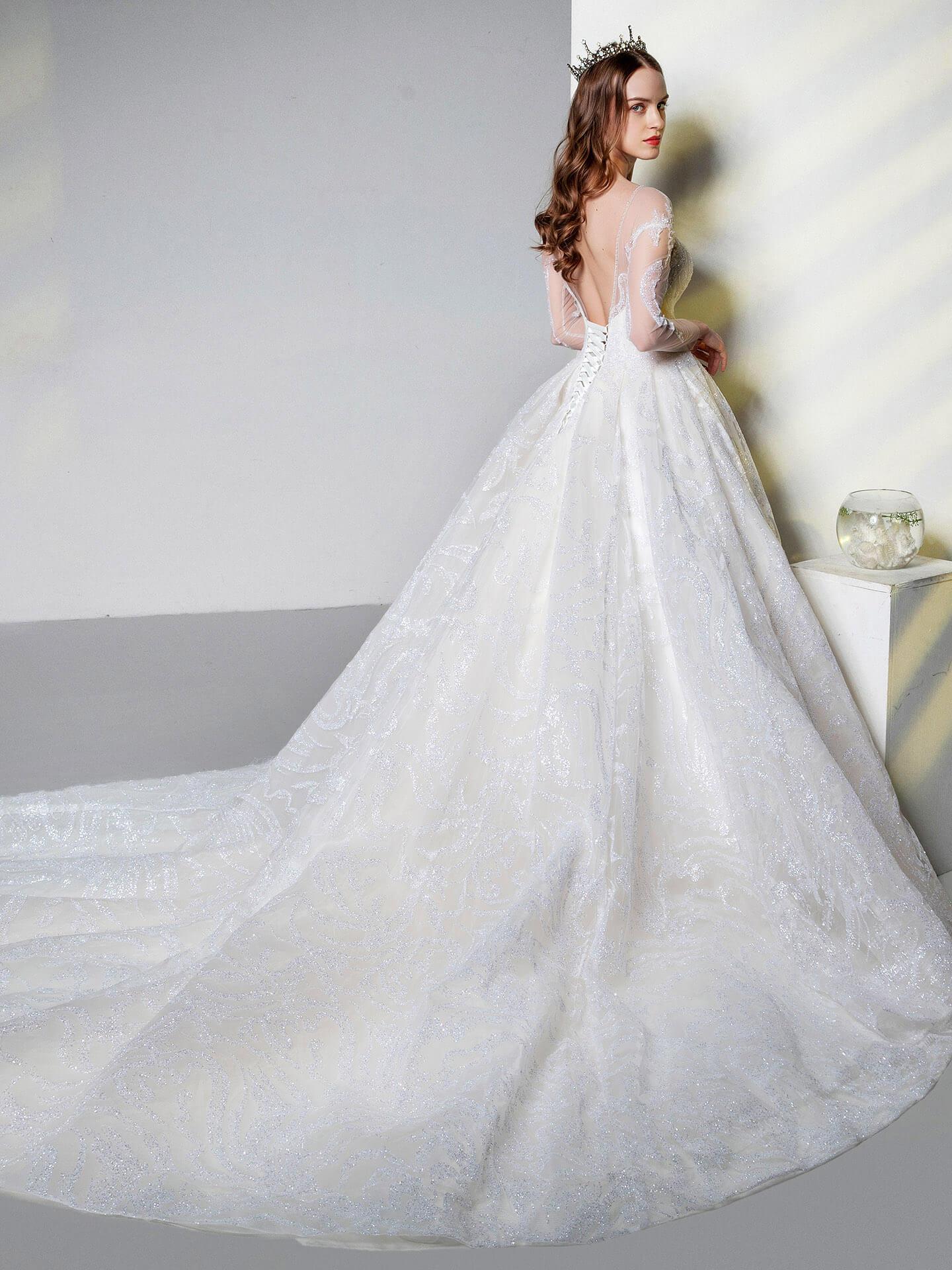 A classic Ball Gown with Sweetheart Neckline Sexy V-back Long See Through Sleeves