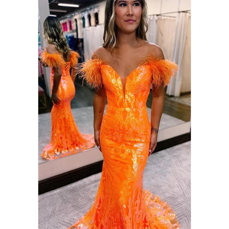 Vestido de fiesta de sirena con escote en V pronunciado y apliques de lentejuelas