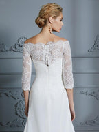 Vestidos de novia de gasa con corte trompeta/sirena, mangas 1/2, hombros descubiertos y cola larga