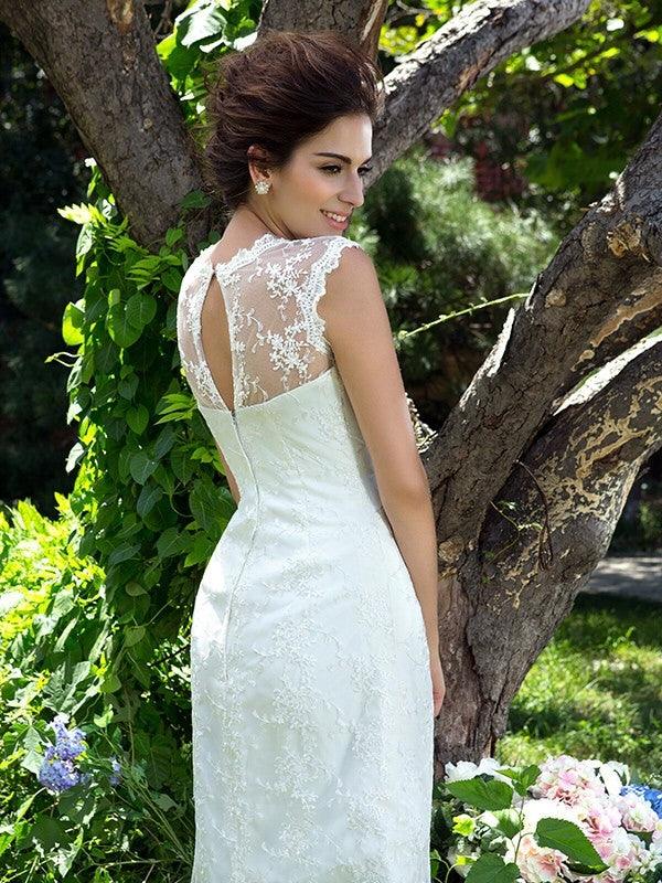 Vestidos de novia princesa cuello transparente apliques sin mangas corto satén
