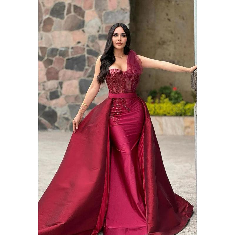 Glamouröses und dramatisches Abendkleid mit einer Schulter und ärmellosem Meerjungfrau-Ausschnitt