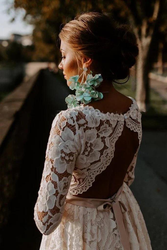 Vestidos de novia de corte A, escote redondo, estilo vintage, de alta calidad, mangas 3/4 y encaje.