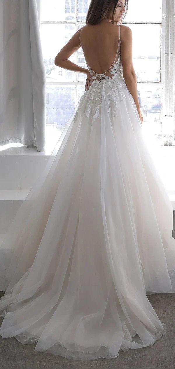 Impresionantes vestidos de novia sin espalda con apliques y tirantes