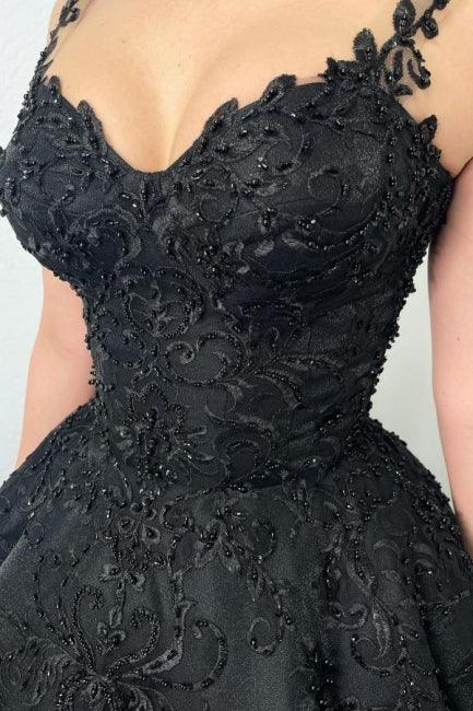 Schwarzes Ballkleid mit bauschigem Abendkleid und Trägern