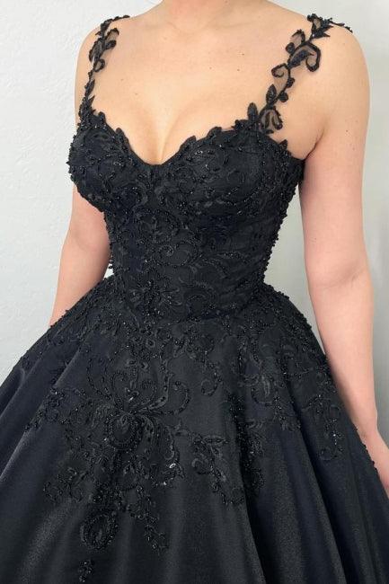 Schwarzes Ballkleid mit bauschigem Abendkleid und Trägern