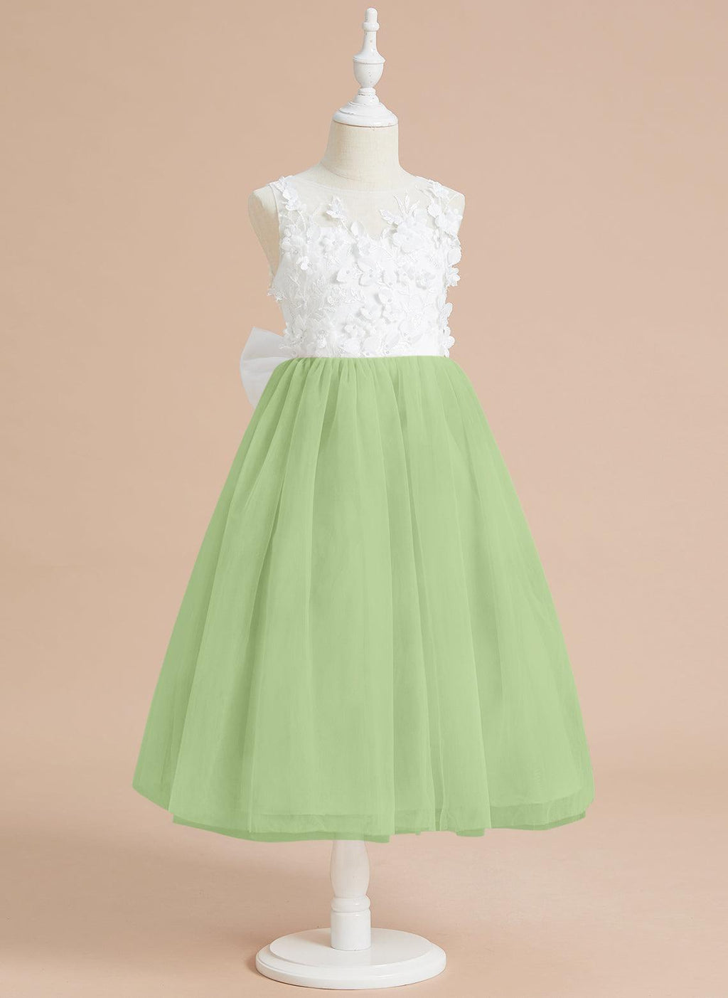 Vestido largo hasta la rodilla con encaje floral y lazo grande 