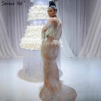 En oferta sin devolución sin reembolsoVenta Dubai Champagne Langarm Sexy Abendkleider Perlen Quaste Elegante Meerjungfrau Formale Kleid Ruhigen Hill LA6559 