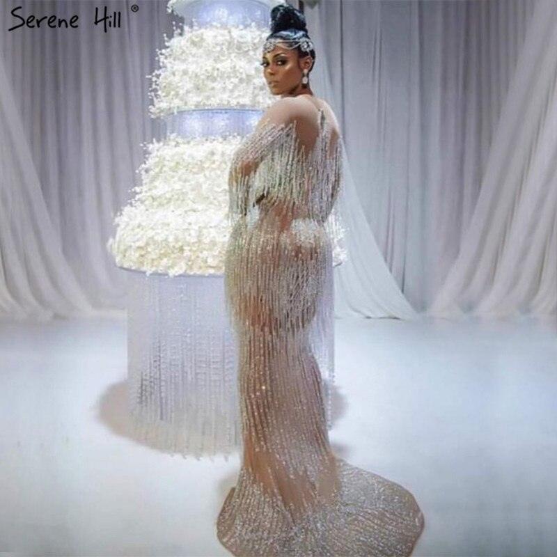 En oferta sin devolución sin reembolsoVenta Dubai Champagne Langarm Sexy Abendkleider Perlen Quaste Elegante Meerjungfrau Formale Kleid Ruhigen Hill LA6559 