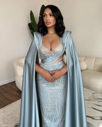 Fabelhaftes langes blaues Meerjungfrau-Ballkleid mit V-Ausschnitt und Paillettenspitze und Ärmeln