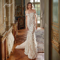 Vestido de novia elegante de Fmogl con escote barco, tirantes finos, encaje, sirena, ilusión sexy, cuentas, perlas, cola de corte, corte trompeta