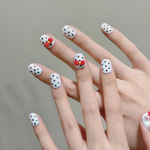 Venta caliente de uñas cortas manuales con lazo de lunares moldeado a mano en 3D 