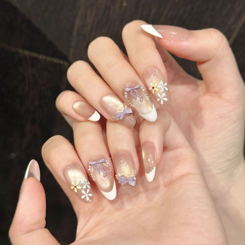 Handmade Nail Art Featuring Sweet Potato butterfly Bow Glass Beads and Cat's Eye Design