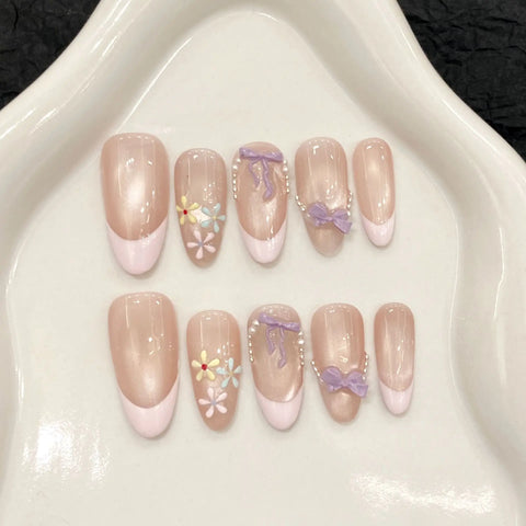 Handmade Nail Art Featuring Sweet Potato butterfly Bow Glass Beads and Cat's Eye Design