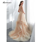 Vestido de novia NumberSea romántico con tirantes finos, color champán, largo, abullonado, con volantes y tul suave 