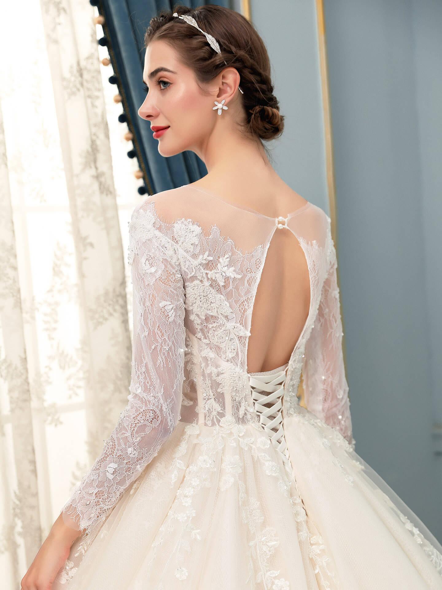 Vestido de novia largo sin mangas con apliques de encaje y tul hasta el suelo