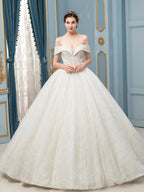 Vestido de novia largo sin mangas con encaje de tul y cuentas hasta el suelo