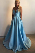 Vestidos de fiesta de corte A con tirantes finos y bolsillos largos
