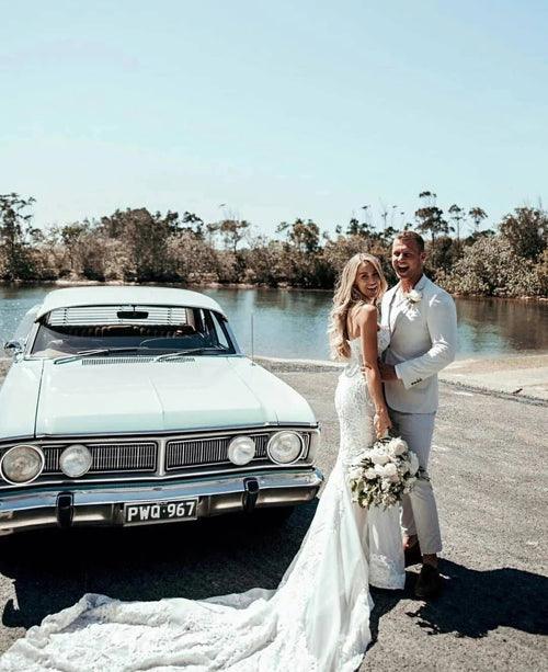 Vestido de novia playero NumberSea con escote corazón, apliques de encaje y cola corte, MW438