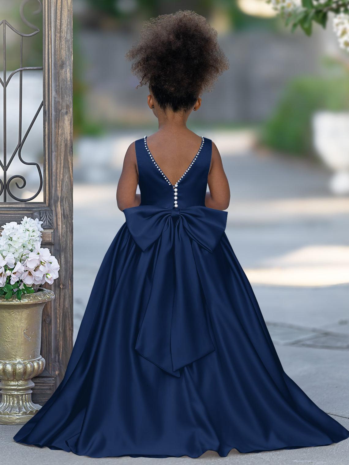 Vestido rosa sin mangas de satén con escote de cuentas y detalle de lazo 