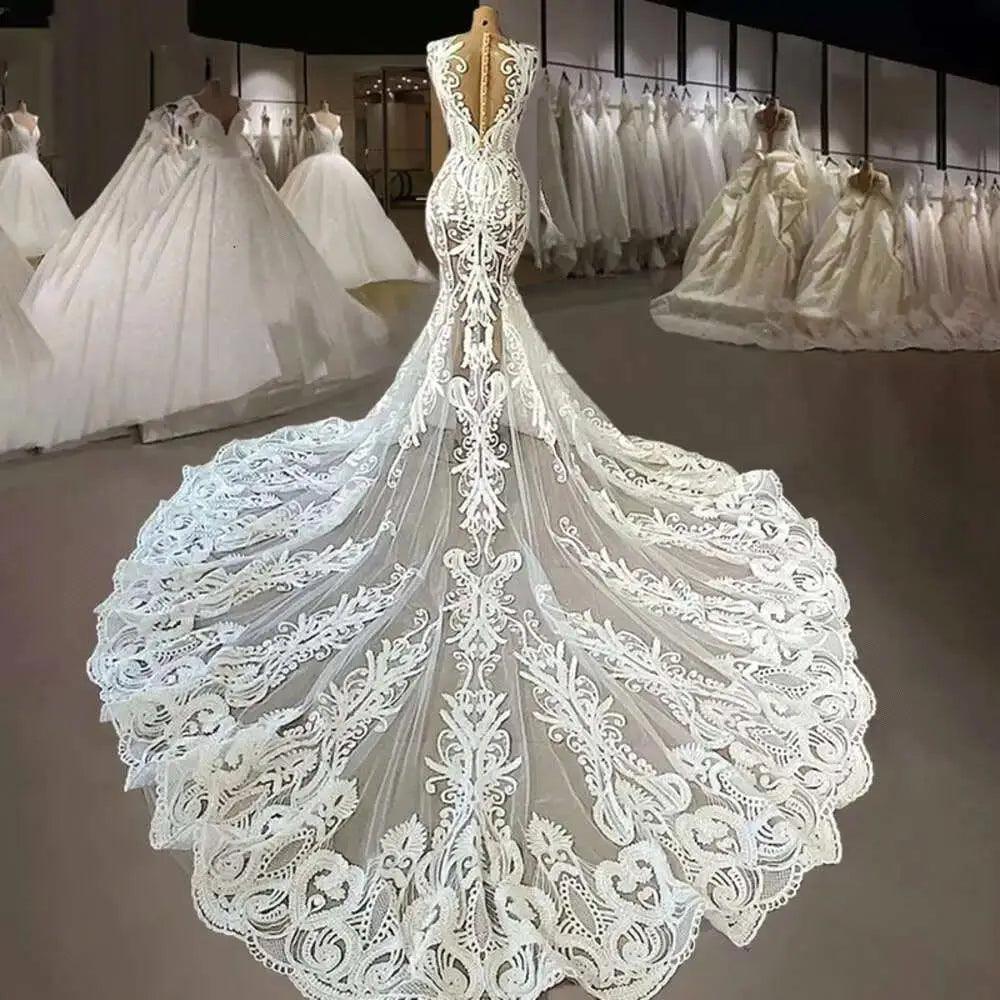 Neue romantische Spitze Brautkleider mit Kathedrale Zug Robe De Mariee Sexy Illusion Zurück Meerjungfrau Brautkleid Vestidos De Novia 