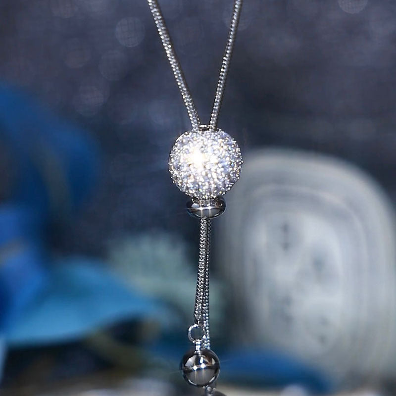 Versatile autumn and winter new trendy ball pendant sweater chain women's long tassel fashion high-end explosive necklace