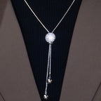 Versatile autumn and winter new trendy ball pendant sweater chain women's long tassel fashion high-end explosive necklace